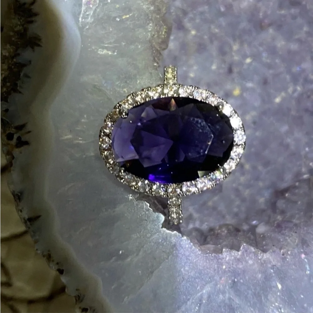 Sterling Silver amethyst prong set cocktail ring with gemstone halo bezel